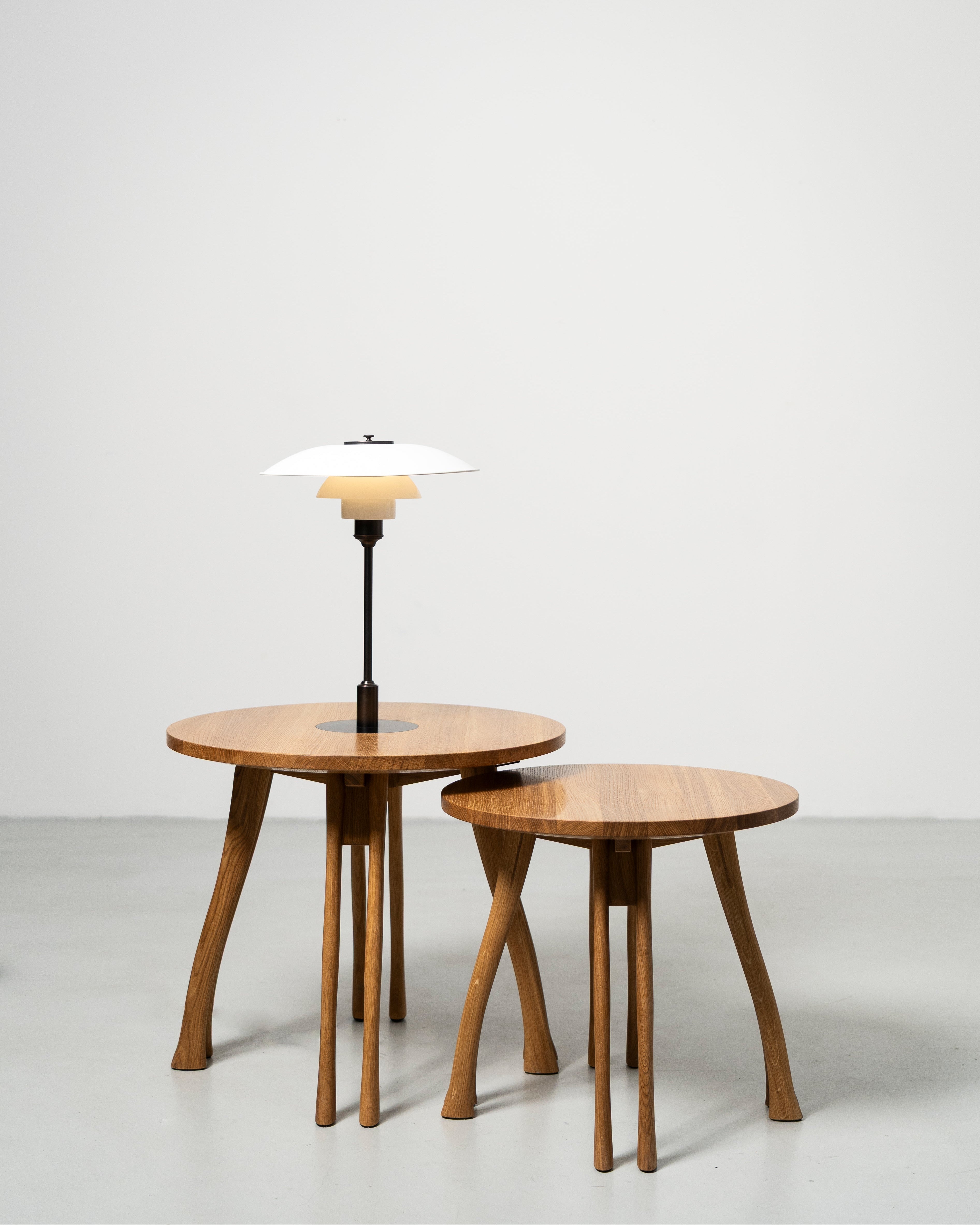 PH Axe Table Lounge by Poul Henningsen, Danish design classic (1954) Two wooden side tables with a PH lamp in white