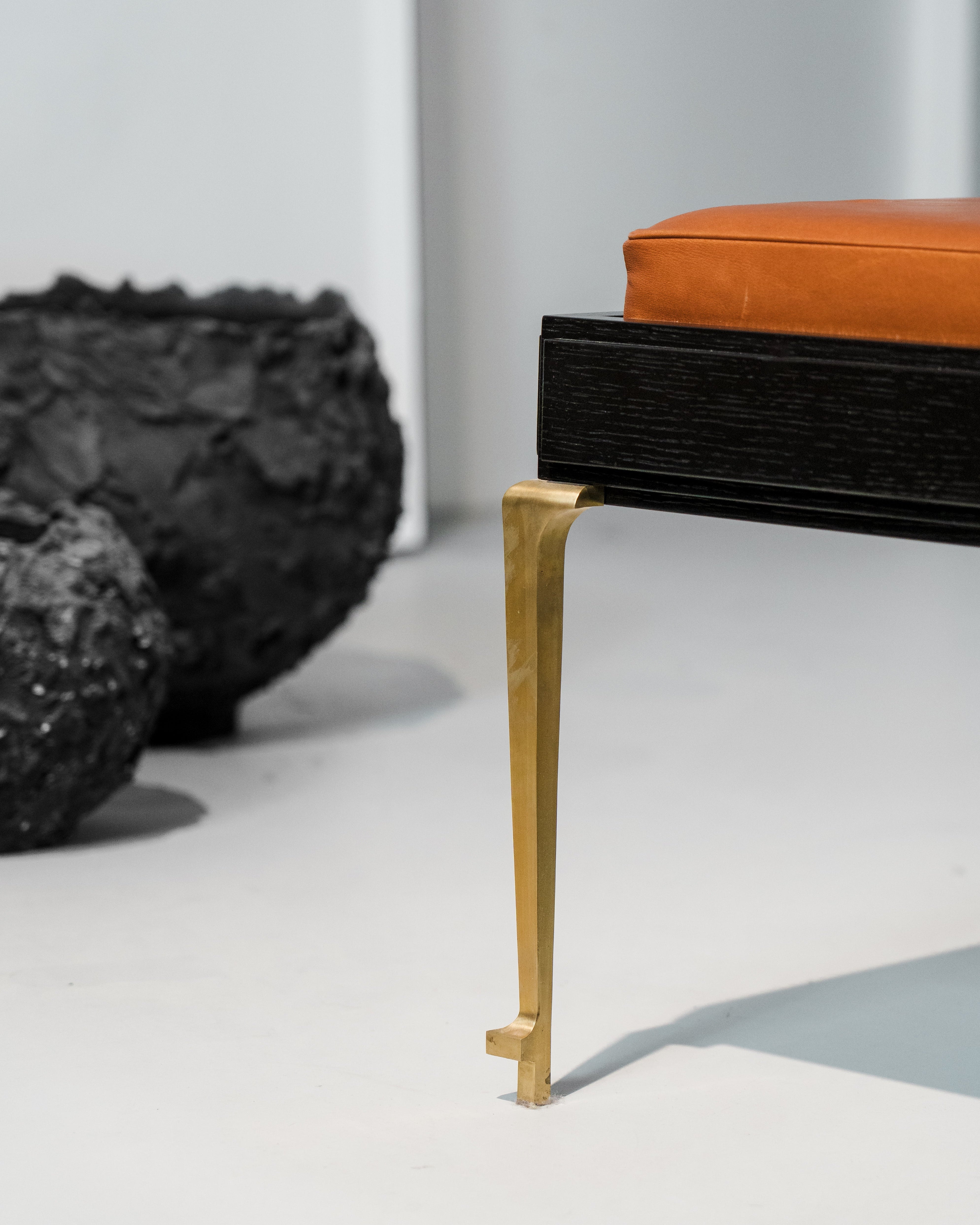 PH Bench by Poul Henningsen, Danish design classic (1930s) Bench with brown leather seat and black frame with brass legs