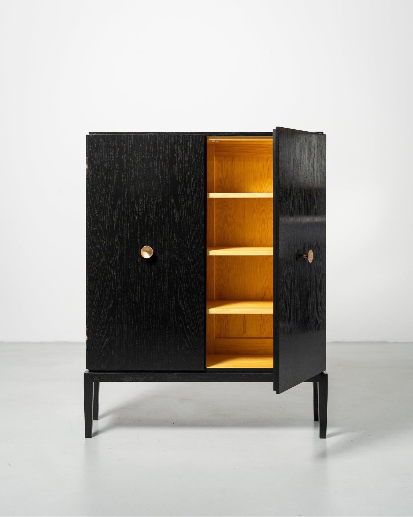 PH Display Cabinet by Poul Henningsen, Danish design classic (1930s)
black oak cabinet with wood doors and brass handles