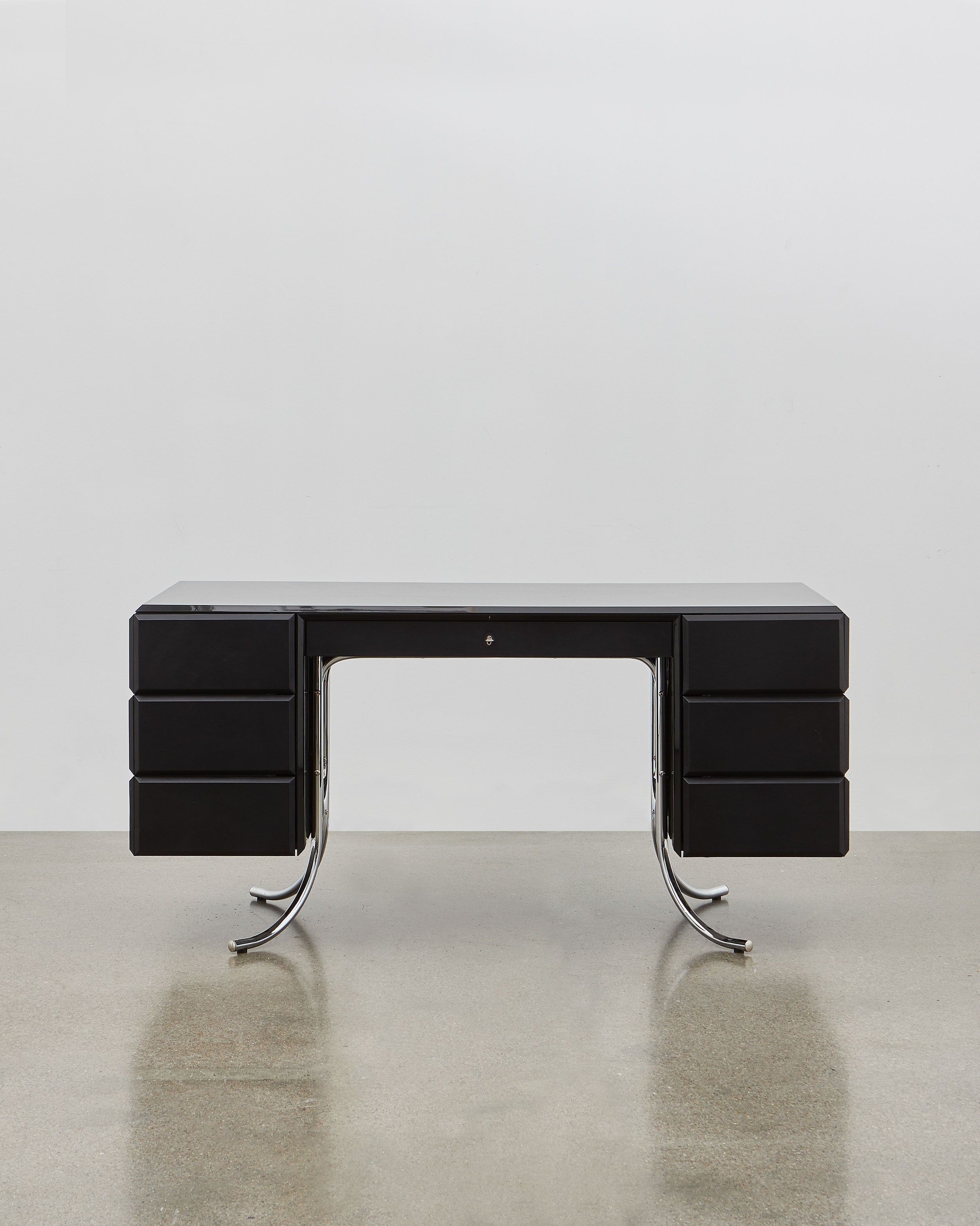 PH Office Desk by Poul Henningsen, Danish design classic (1930s)
A sleek black office desk with high gloss finish, six leather swing drawers, and chromed legs, designed by Poul Henningsen.