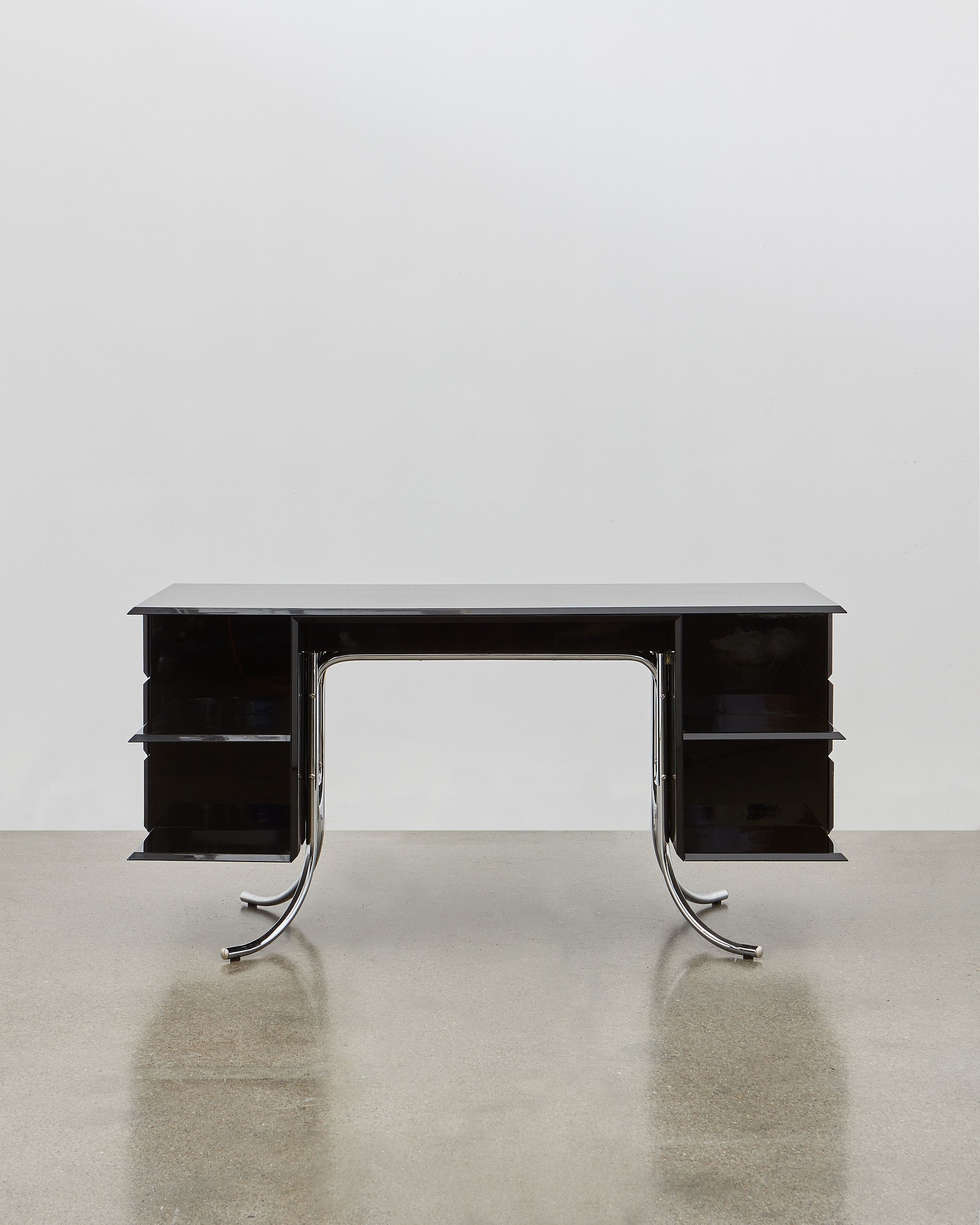 PH Office Desk by Poul Henningsen, Danish design classic (1930s)
A sleek black office desk with high gloss finish, six leather swing drawers, and chromed legs, designed by Poul Henningsen.