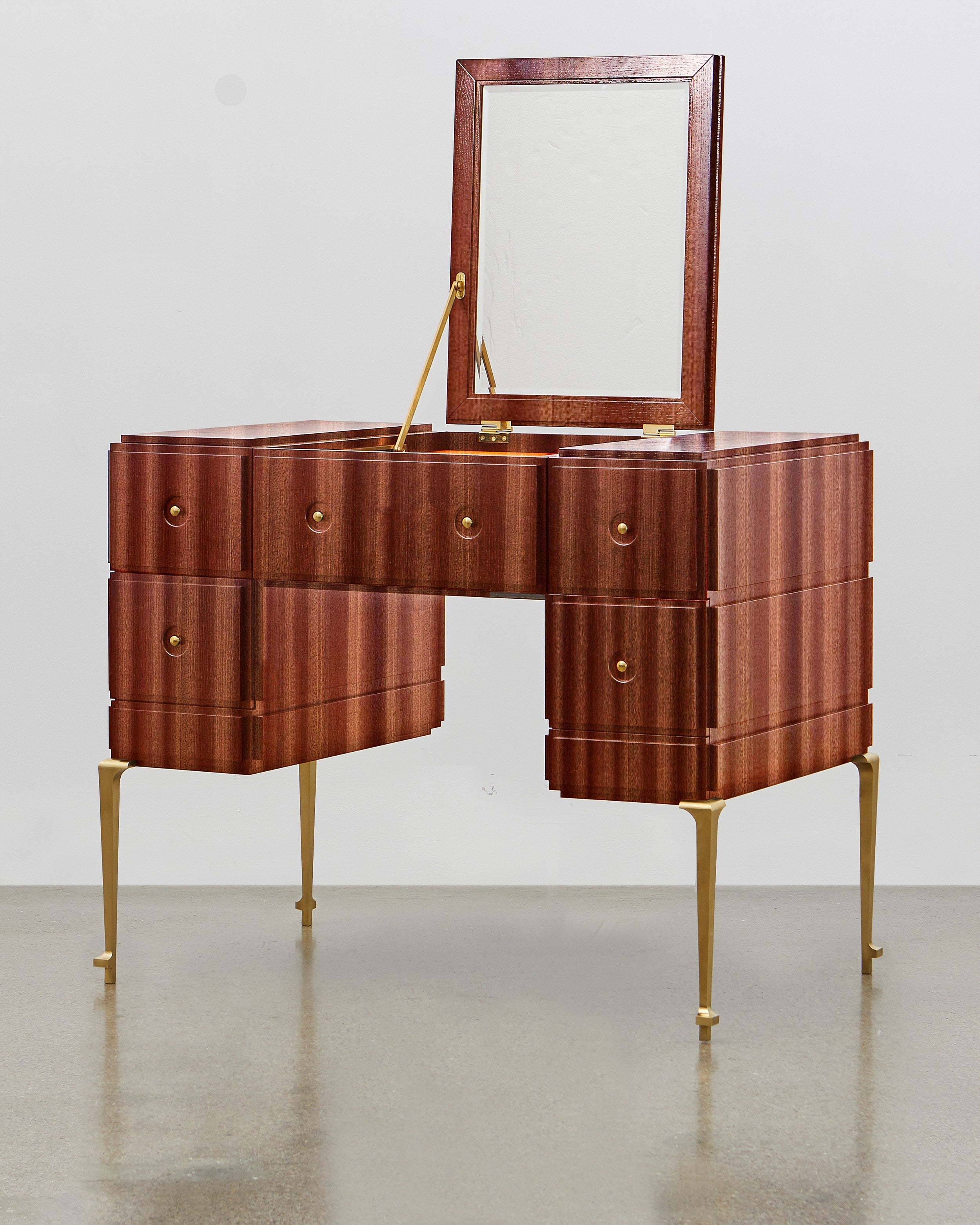 PH Grand Dressing Table by Poul Henningsen, Danish design classic (1919)
Black PH Grand Dressing Table with five drawers and gold-colored accents on the frame and handles, featuring a fold-down mirror.