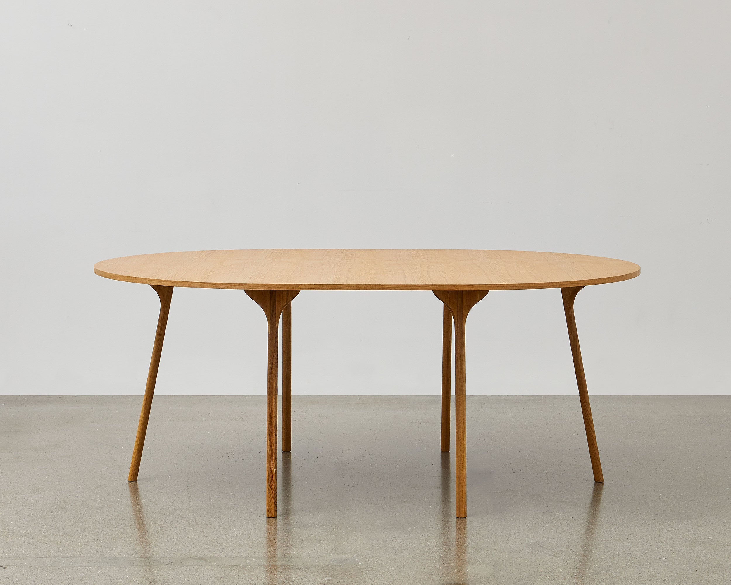 PH Circle Table by Poul Henningsen, Danish design classic (1937)
A minimalist round table with wooden legs and tabletop