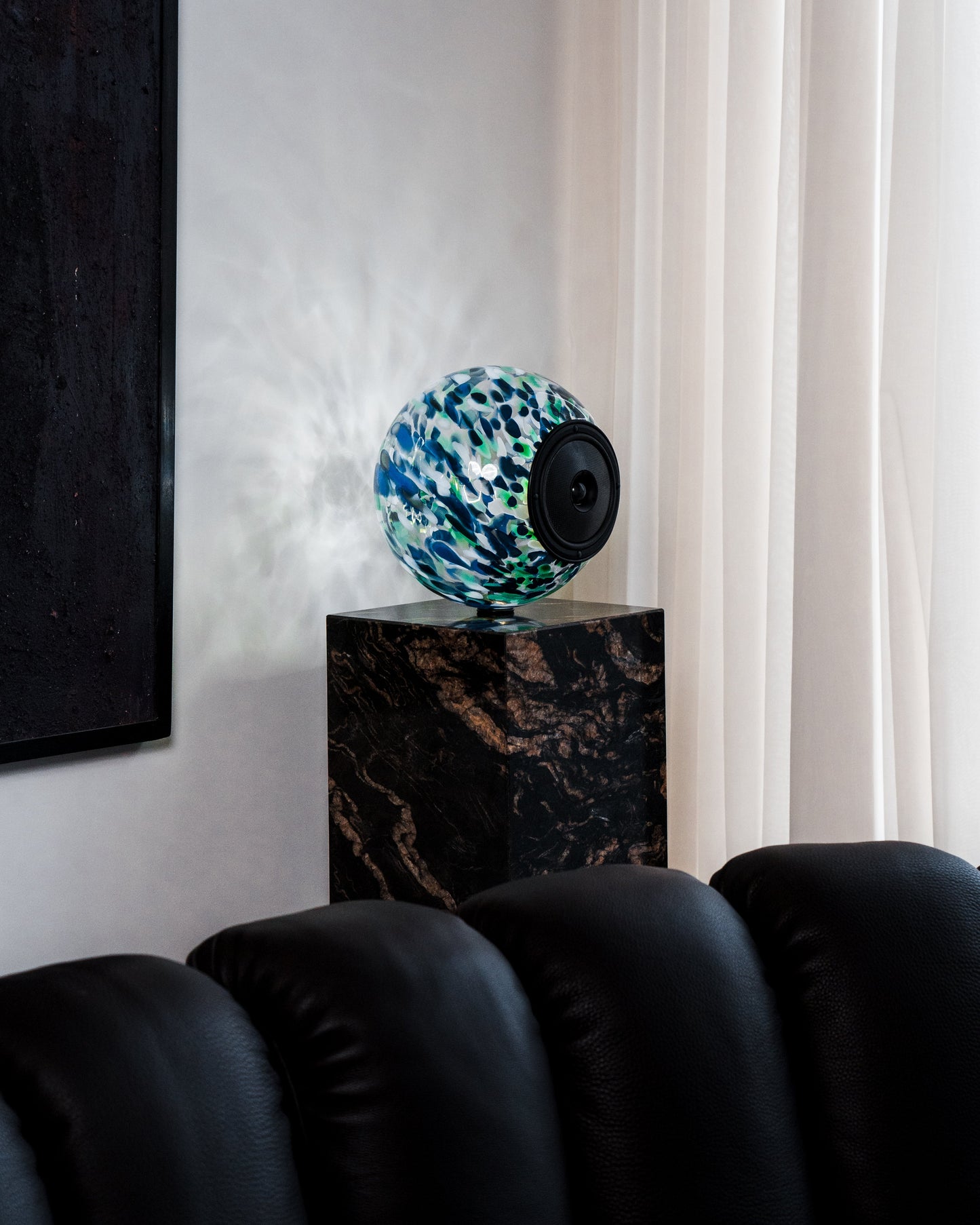 Glass Ball Speaker, sculptural audio design mouth-blown glass sphere with the speaker driver built in 