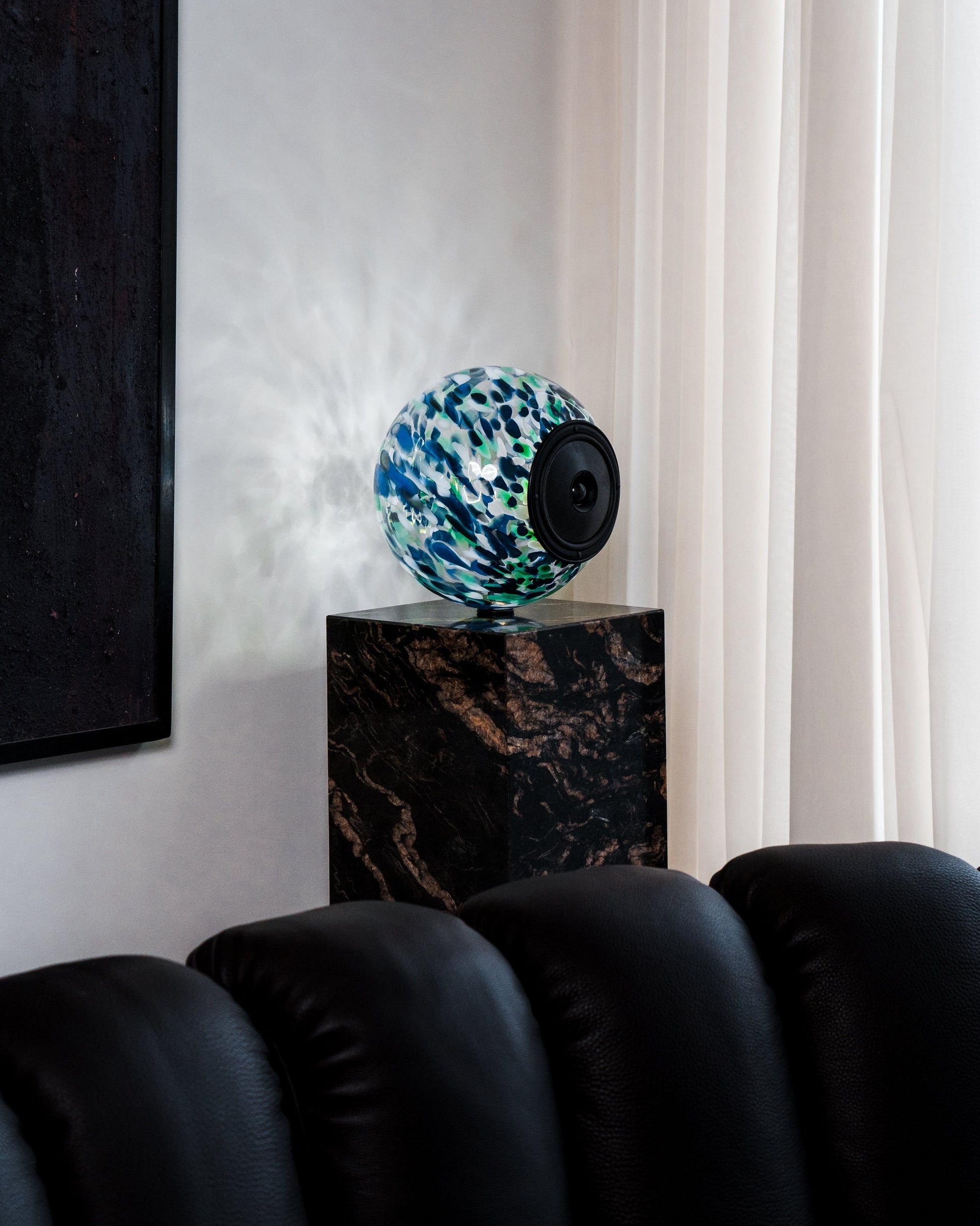 Glass Ball Speaker, sculptural audio design mouth-blown glass sphere with the speaker driver built in 