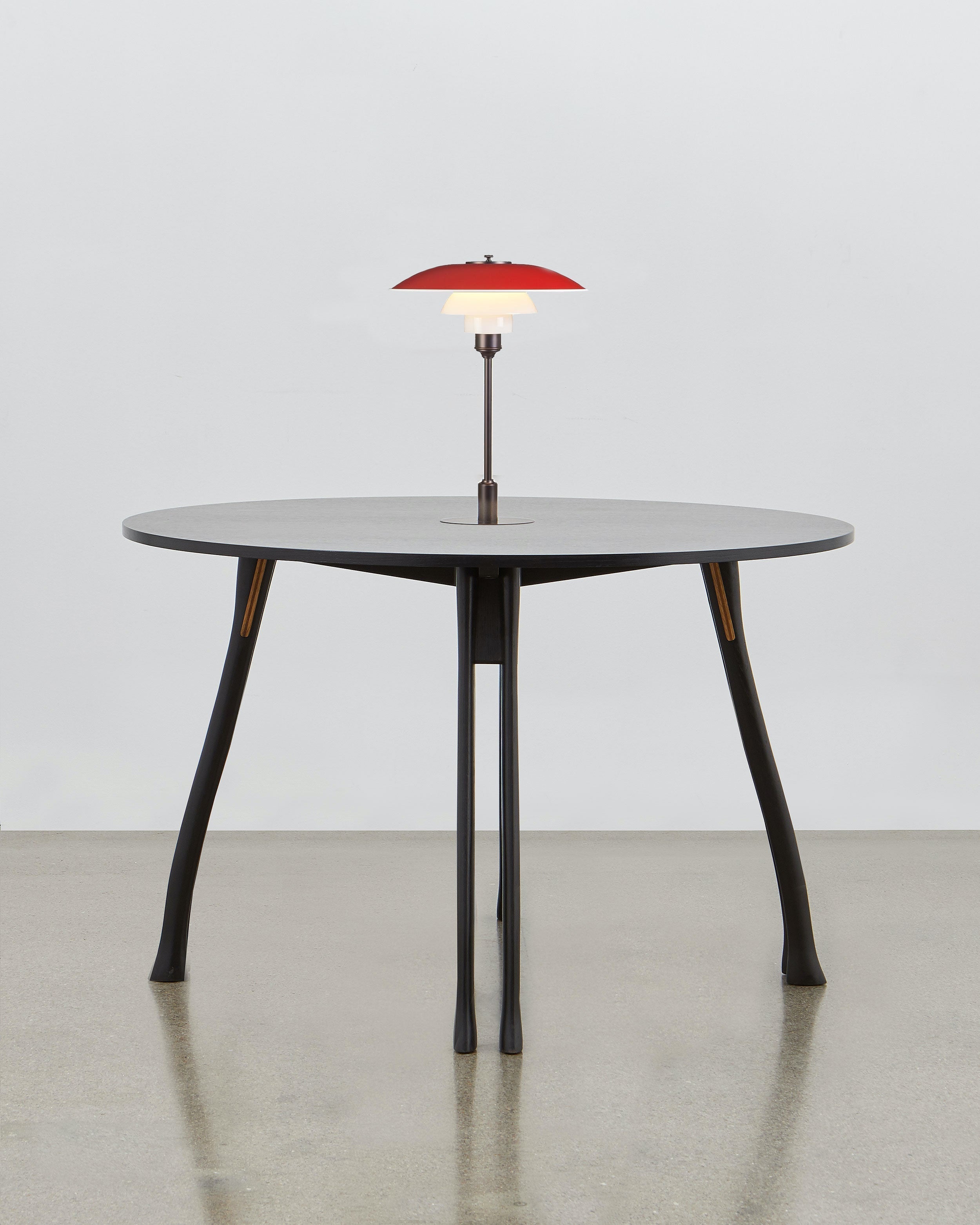 PH Axe Table by Poul Henningsen, Danish design classic (1954) Black painted oak wood with PH Lamp in red