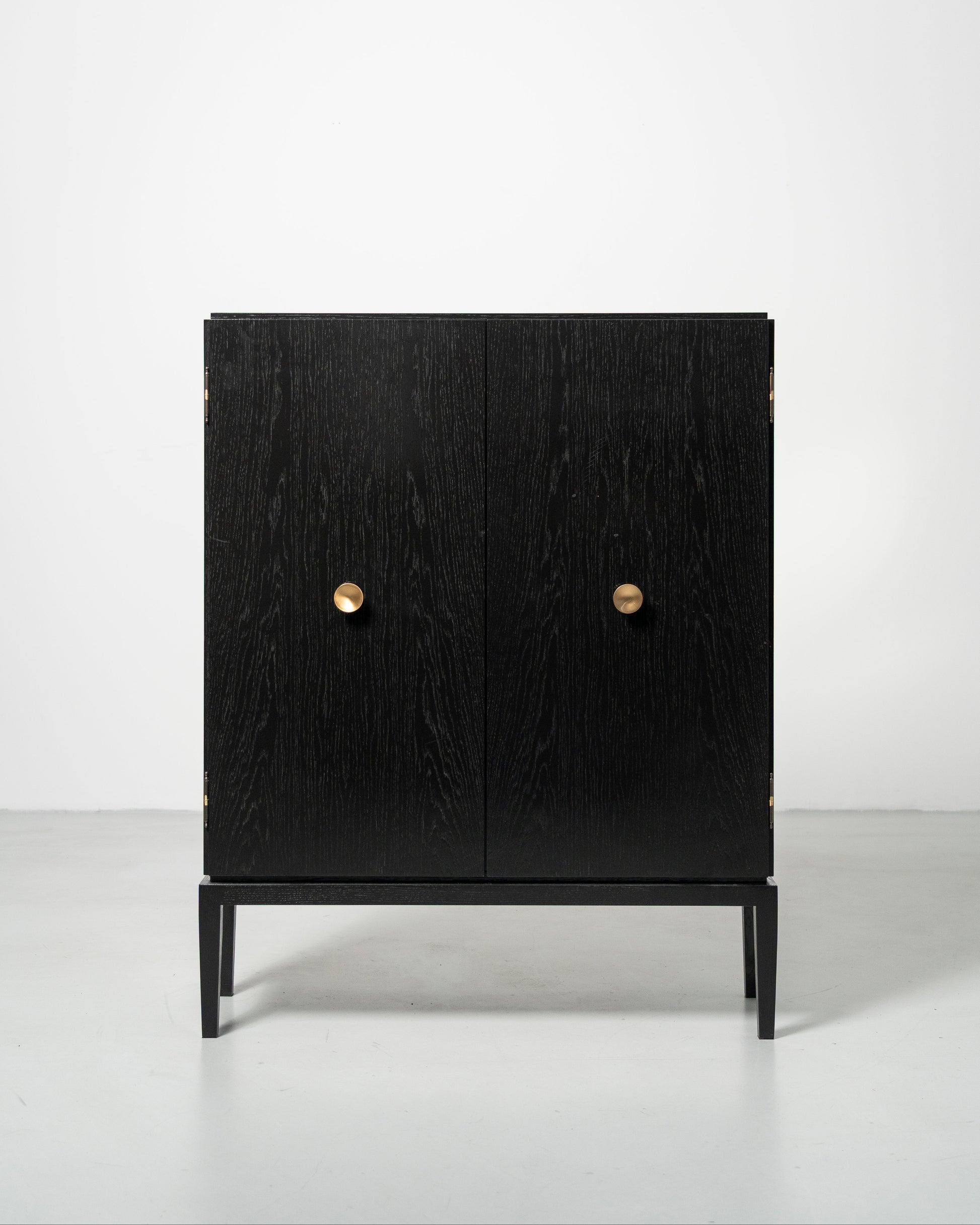 PH Display Cabinet by Poul Henningsen, Danish design classic (1930s)
black oak cabinet with wood doors and brass handles