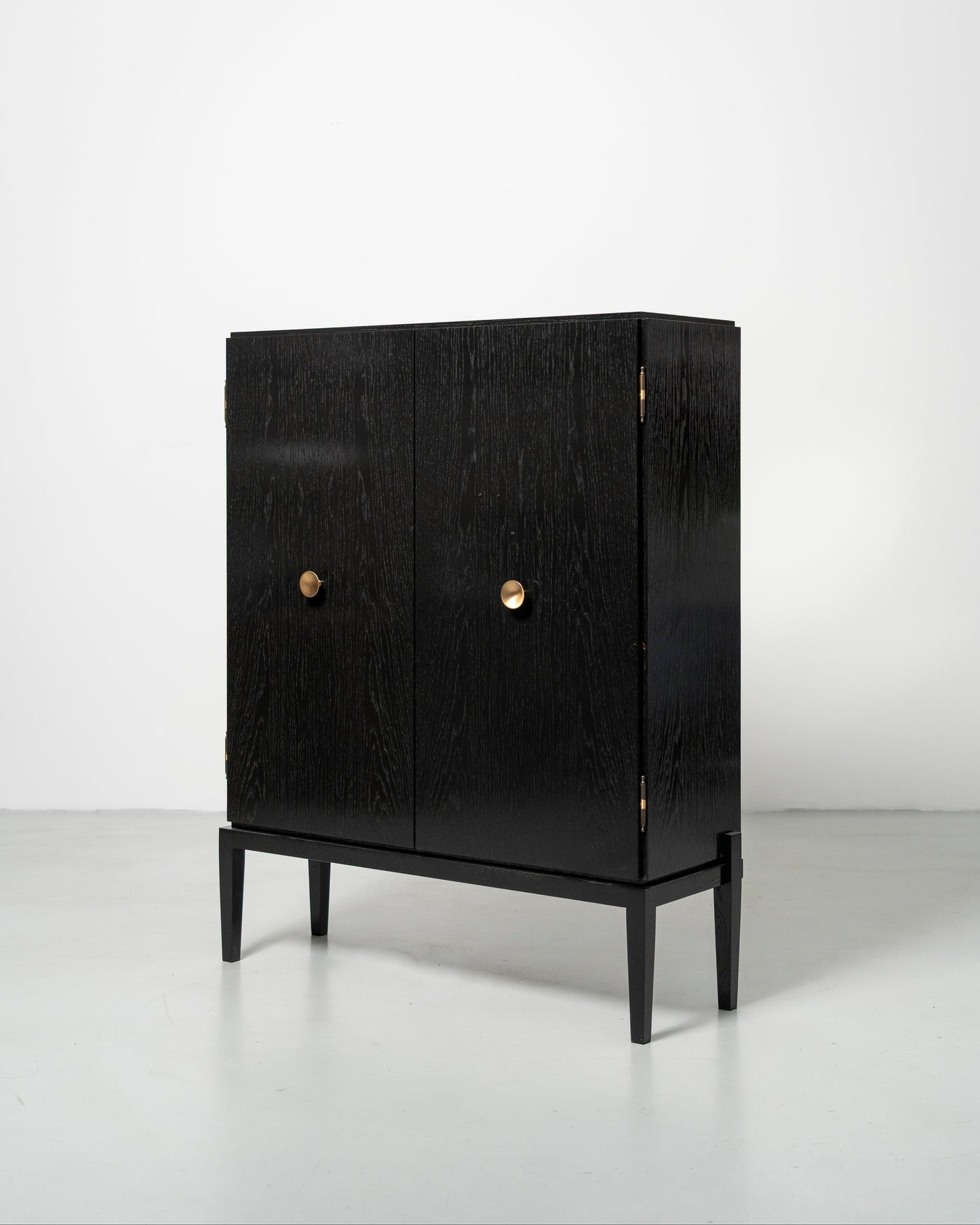 PH Display Cabinet by Poul Henningsen, Danish design classic (1930s)
black oak cabinet with wood doors and brass handles