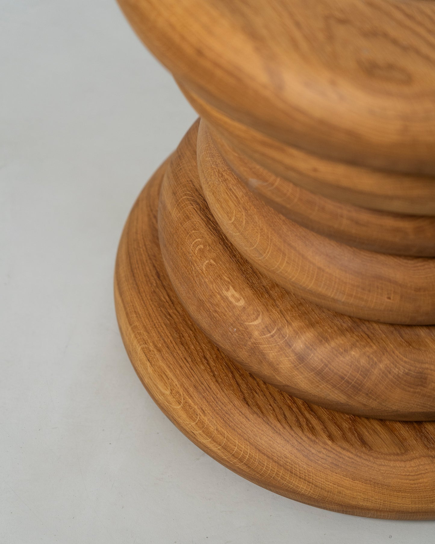 Spine Stool designed by Caisa Leifsdotter sculptural solid oak stool that also works as a compact side table