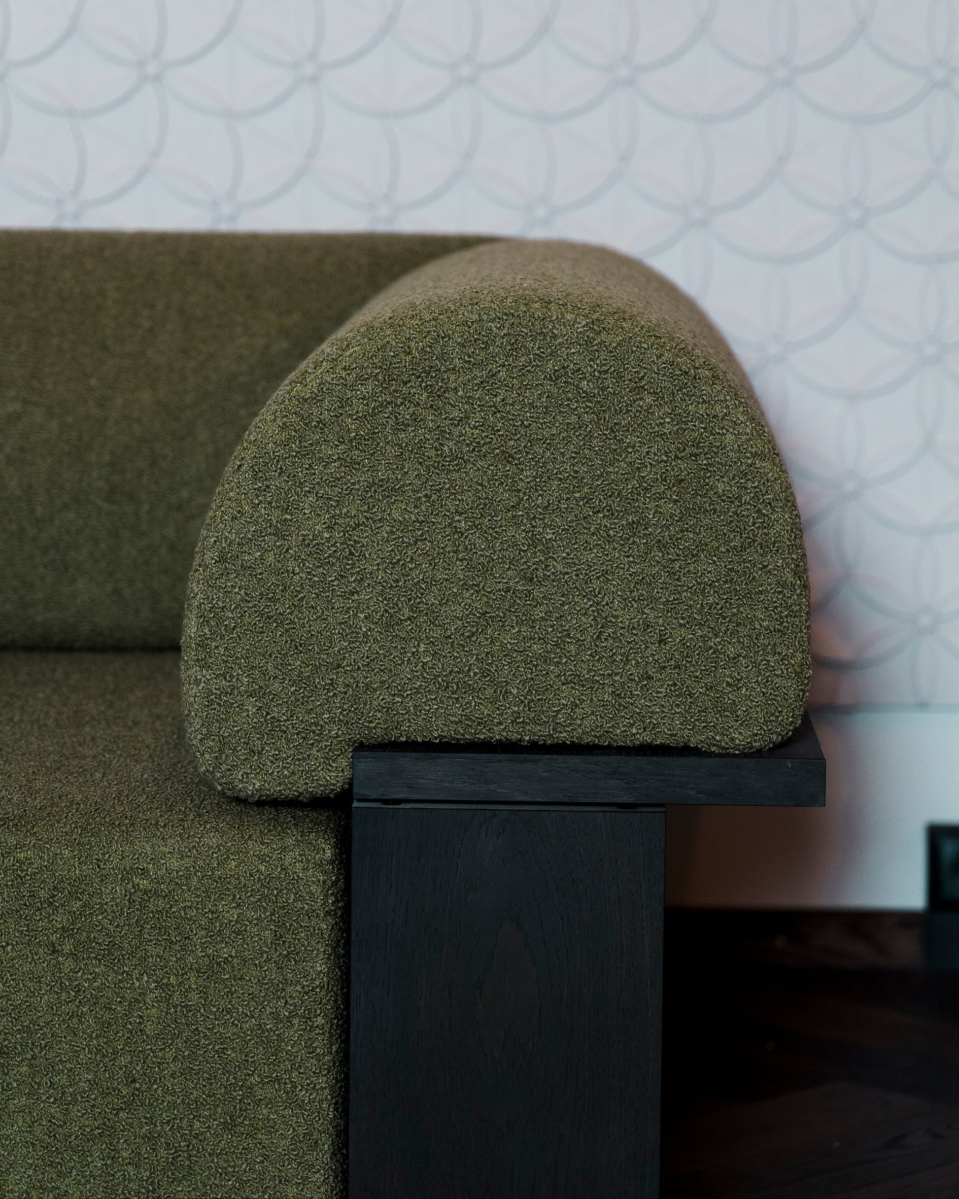 Wittorin Sofa Designed by Caisa Leifsdotter, Scandinavian design A solid-wood base frames a generous seat; movable arm and back cushions support both corner and straight layouts. The wooden surround doubles as a low table surface for lamps, books or a tray.