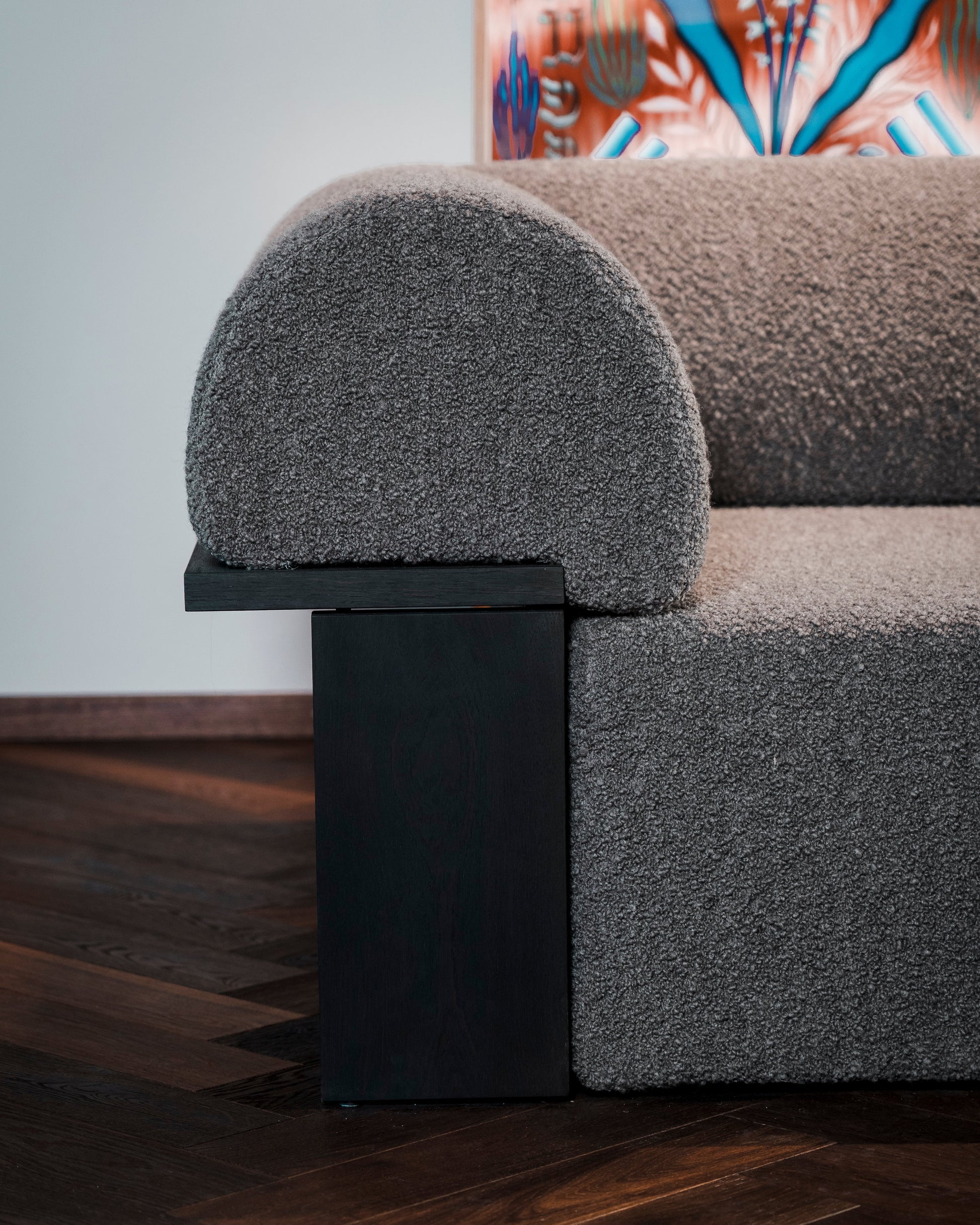 Wittorin Sofa Designed by Caisa Leifsdotter, Scandinavian design A solid-wood base frames a generous seat; movable arm and back cushions support both corner and straight layouts. The wooden surround doubles as a low table surface for lamps, books or a tray.