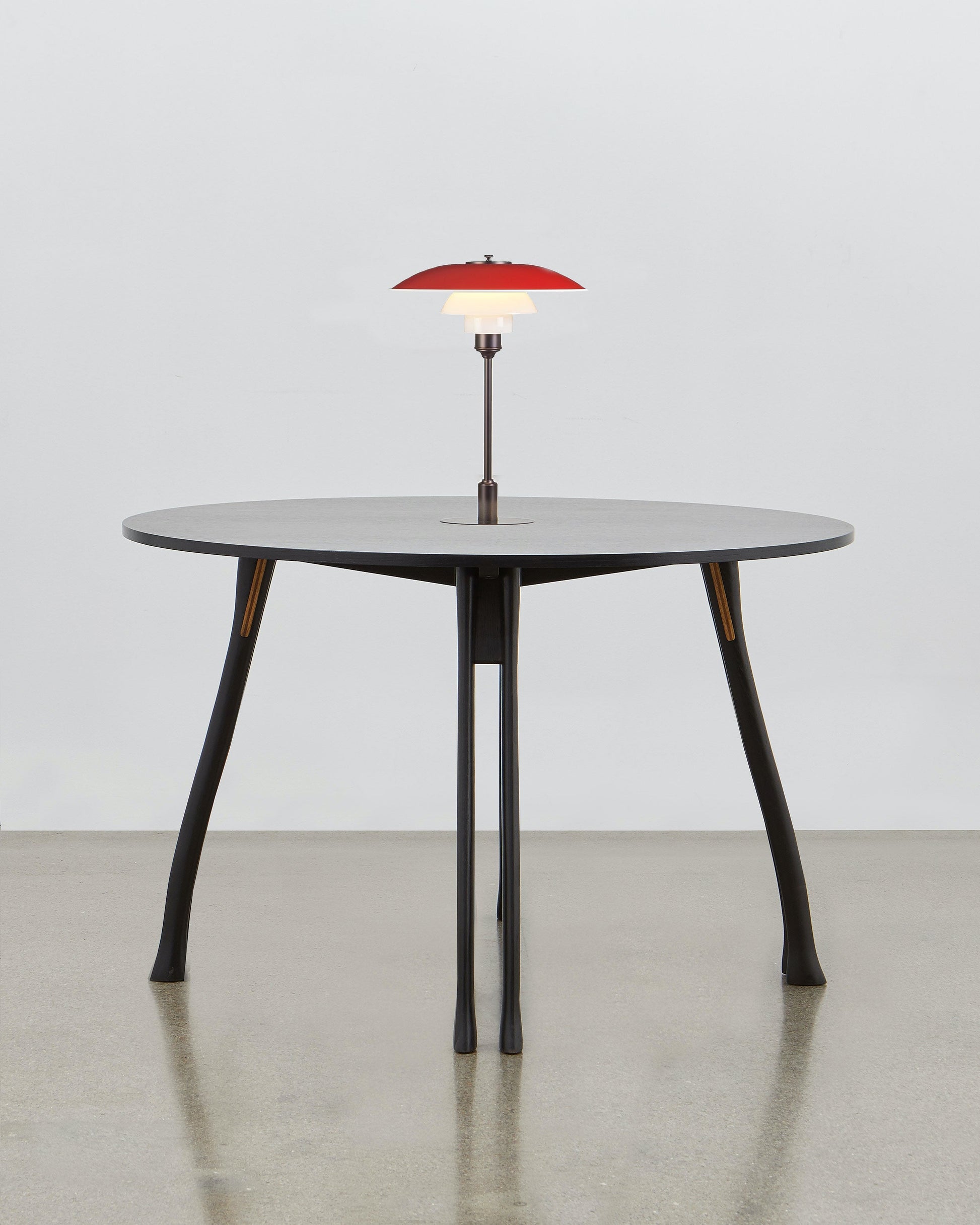 PH Axe Table by Poul Henningsen, Danish design classic (1954) Black painted oak wood with PH Lamp in red