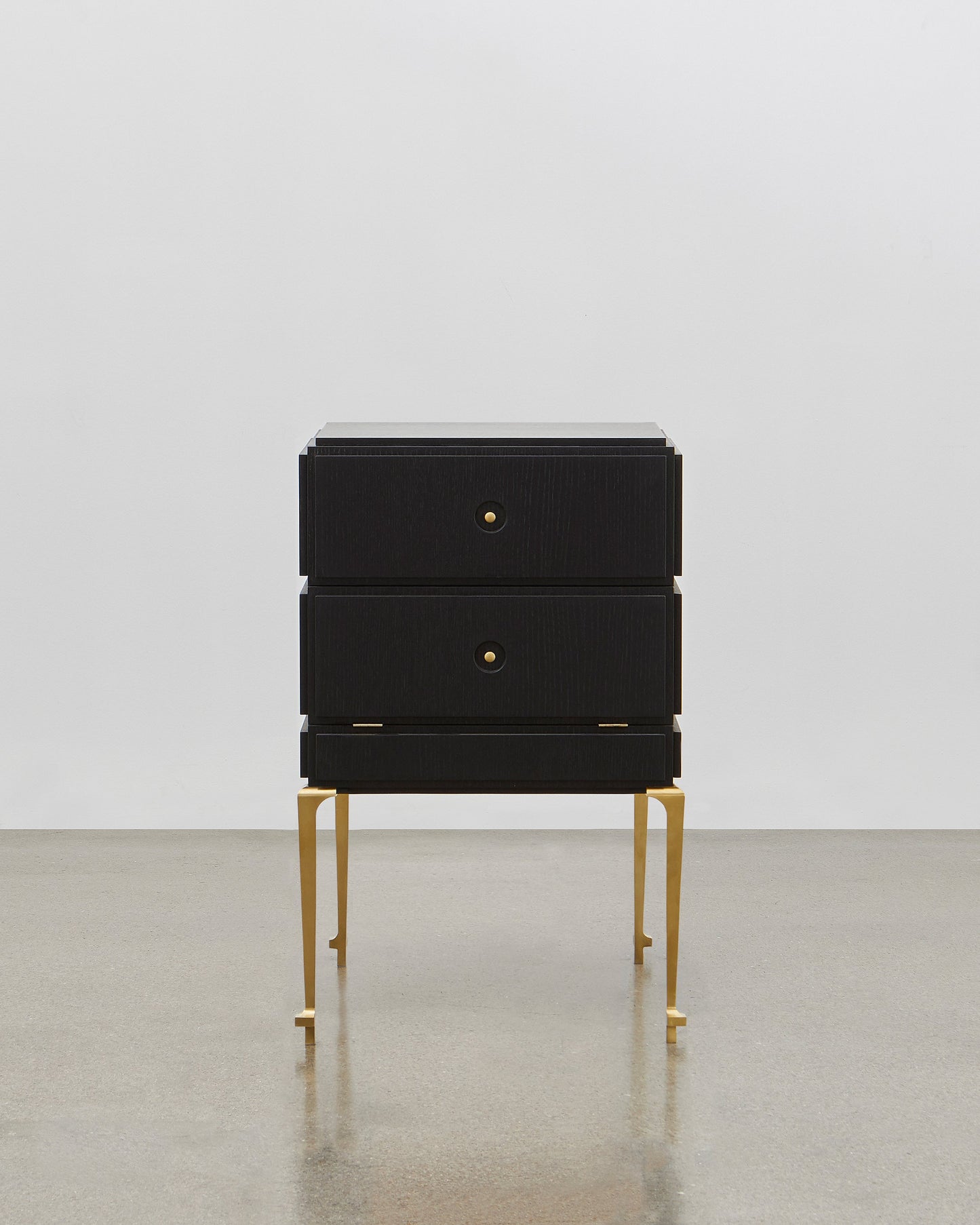 PH Small Drawer Chest by Poul Henningsen, Danish design classic (1930s) A small black wooden drawer chest with brass legs 