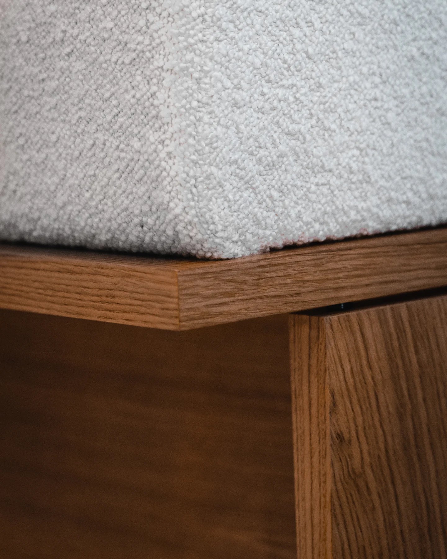 Wittorin Sofa Designed by Caisa Leifsdotter, Scandinavian design A solid-wood base frames a generous seat; movable arm and back cushions support both corner and straight layouts. The wooden surround doubles as a low table surface for lamps, books or a tray.